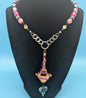 Pink Bleeding Heart Coyote Bone Necklace